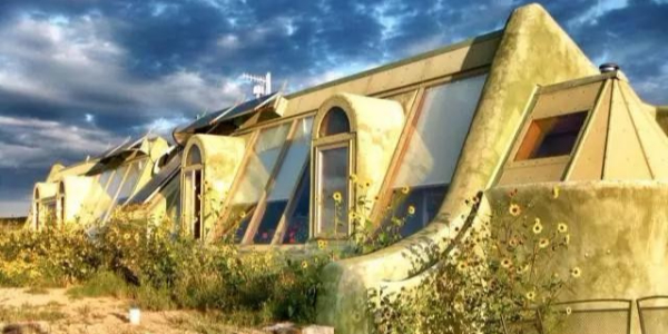 這個(gè)老炮兒建筑師讓難民住垃圾堆，卻贏得全世界尊重！